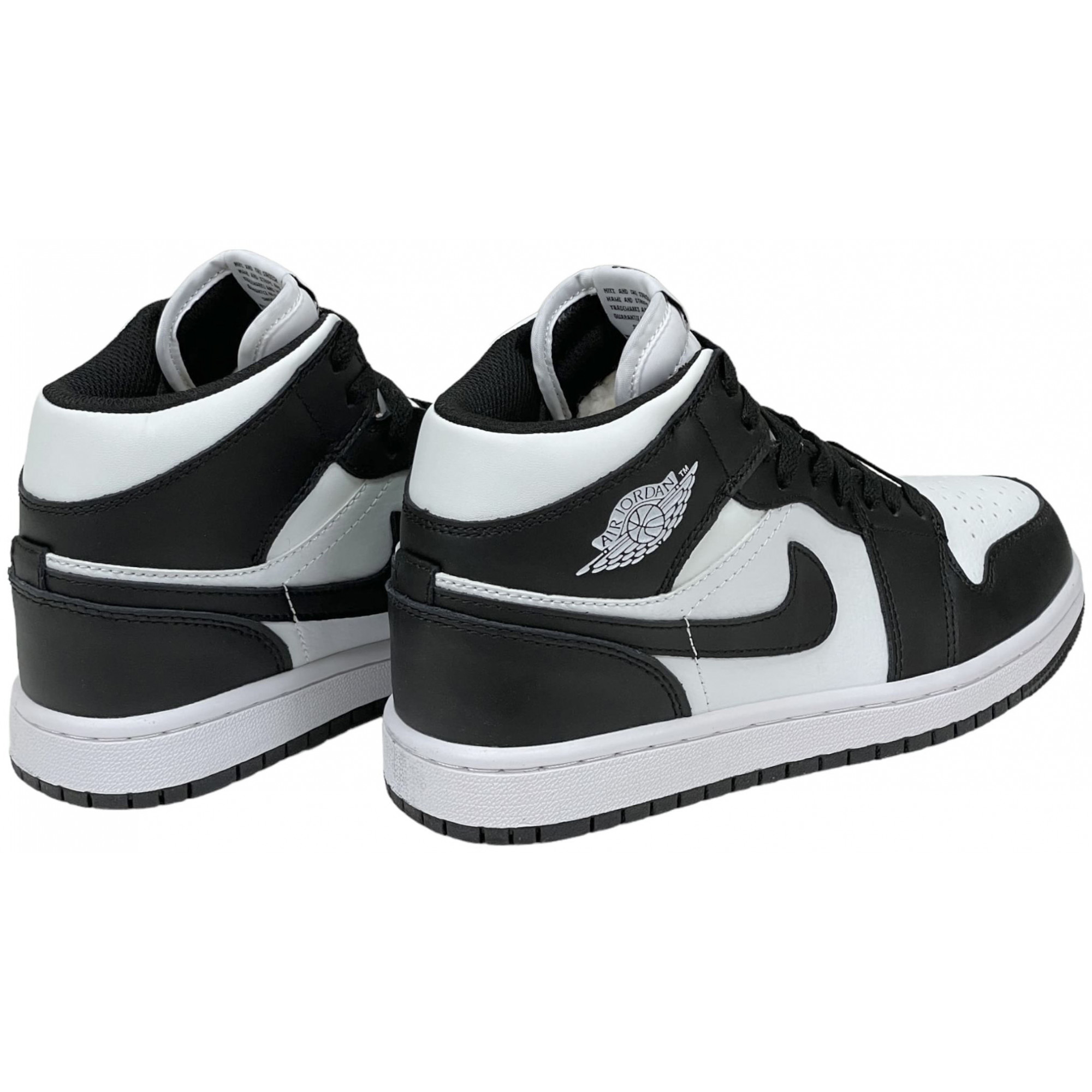 black and white youth jordans